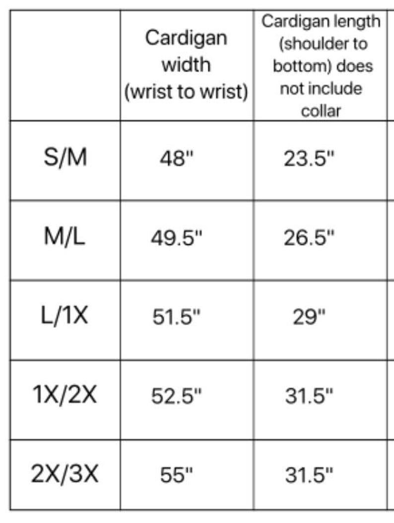 May include: A size chart for a cardigan showing the cardigan width in inches from wrist to wrist and the cardigan length in inches from shoulder to bottom, excluding the collar. Sizes range from S/M to 2X/3X.