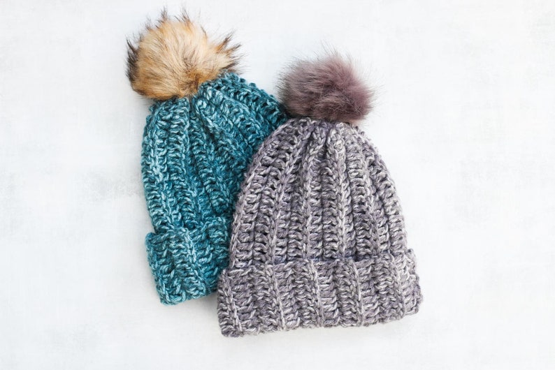 Two easy adult beanies made from a rectangle with pom poms.