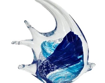 May include: A glass sculpture of a blue and turquoise fish with a clear glass body. The fish is abstract and has a flowing, organic shape.