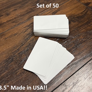 May include: Set of 50 blank white cards, 2" x 3.5", made in the USA.