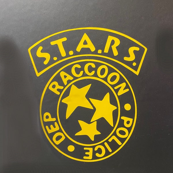 Resident Evil S.T.A.R.S. RPD inspired decal printed from permanent yellow all weather vinyl.