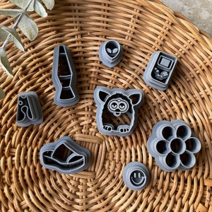 90s Polymer Clay Cutters, Furby, Lava Lamp, Smiley Flower, Game Boy Alien, Platform Shoe, Unique Earring Shapes, Throwbacks, The Clayful Co.