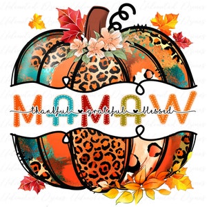May include: A colorful fall-themed pumpkin with a leopard print design and the word "Mamaw" written in a stitched font with the words "thankful, grateful, blessed" underneath.