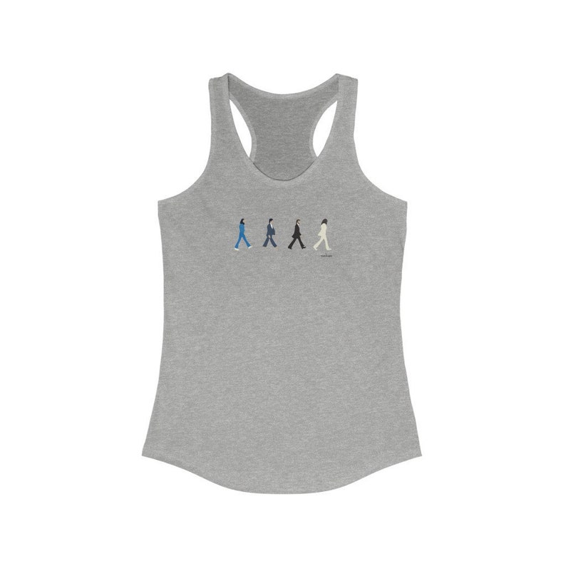 May include: A grey tank top featuring a graphic of four figures walking in a line. The figures are wearing different coloured clothing, including blue, black and white.