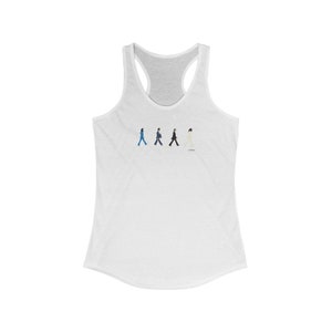 May include: White tank top featuring a graphic of four figures walking in a line. The figures are wearing different coloured clothing. The graphic is centred on the tank top.