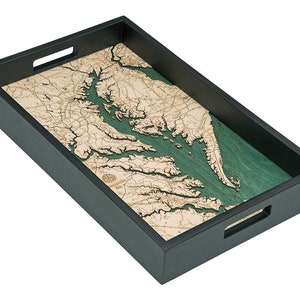 May include: A wooden serving tray with a black frame and a detailed map of the Chesapeake Bay in wood and green paint.