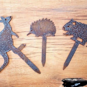 Set of 3 miniature Australian animal corten (rusty) pot plant stakes - kangaroo, echidna & wombat.