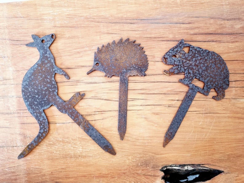Set of 3 miniature Australian animal corten (rusty) pot plant stakes - kangaroo, echidna & wombat.