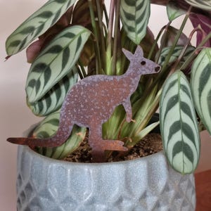 Miniature Australian-made corten (rusty) kangaroo pot plant stake.