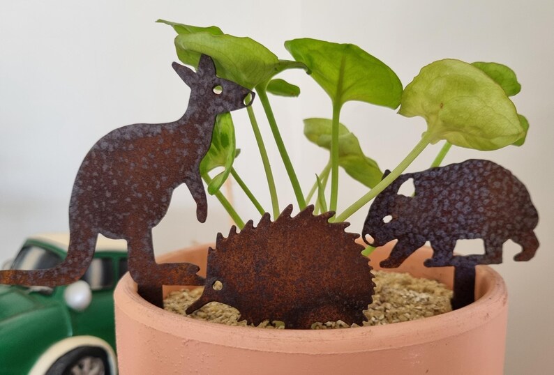 Set of 3 miniature Australian animal corten (rusty) pot plant stakes - kangaroo, echidna & wombat.