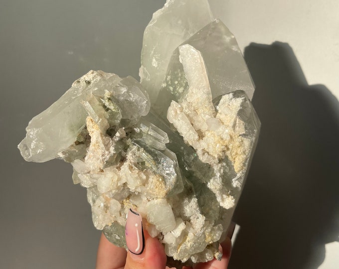 Triples phantom chlorite quartz with calcite fluorite and mica specimen
