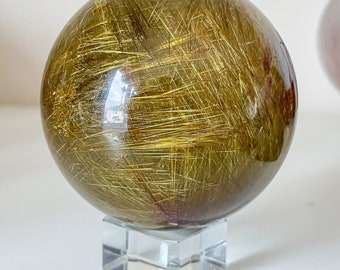 Finest Golden Rutilated Quartz sphere - luxury Crystal for Home decor and manifestation