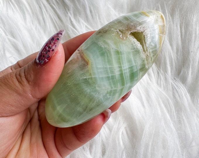 green calcite shiva palmstone | green pistachio calcite