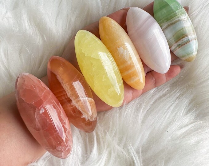 Rainbow calcite shiva palmstone | rose calcite | honey calcite | mango calcite | lemon calcite | pink mangano calcite | green pistachio calc