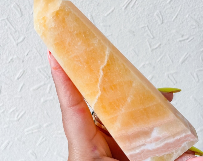 orange calcite point tower
