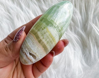 green calcite shiva palmstone | green pistachio calcite