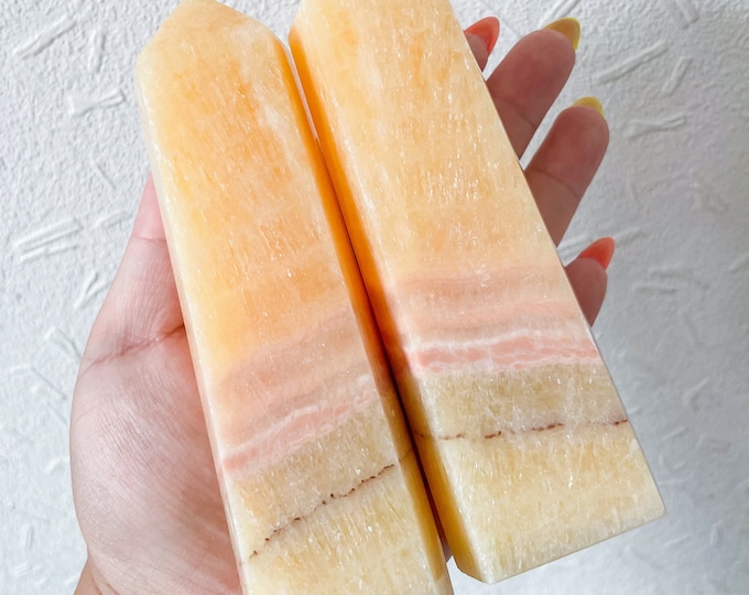 orange calcite point tower