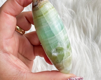 green calcite shiva palmstone | green pistachio calcite