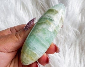 green calcite shiva palmstone | green pistachio calcite
