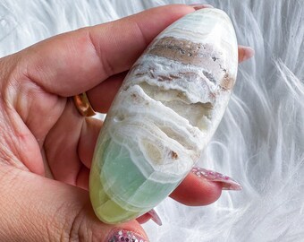 green calcite shiva palmstone | green pistachio calcite