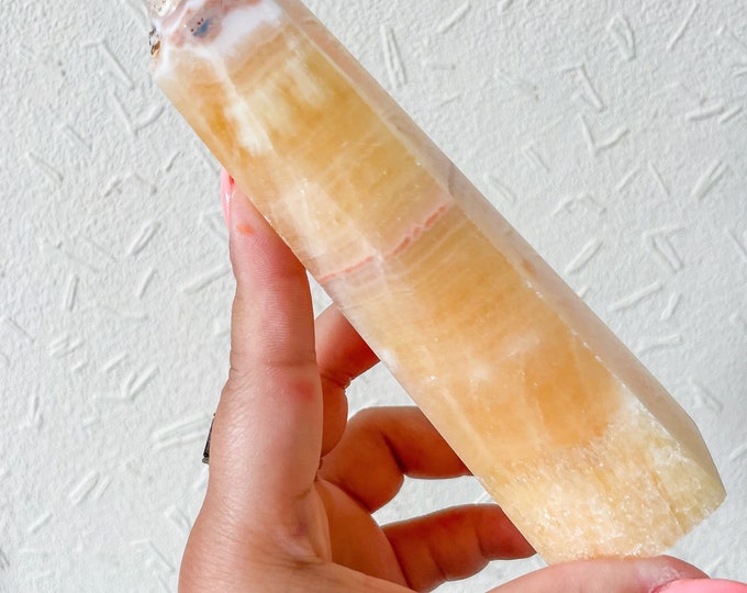 orange calcite point tower