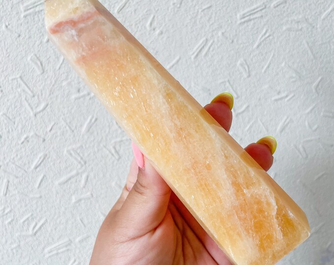 orange calcite point tower