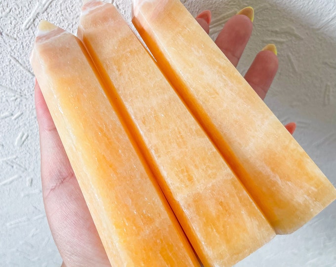 orange calcite point tower