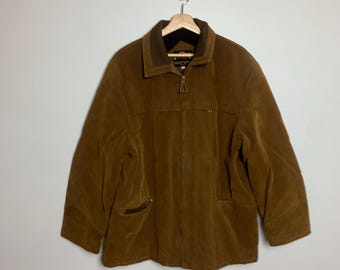 May include: A brown suede jacket with a zipper closure and a brown corduroy collar.