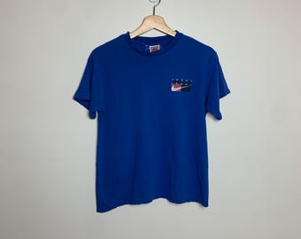 Camiseta con el logotipo de Nike en gris de los años 90