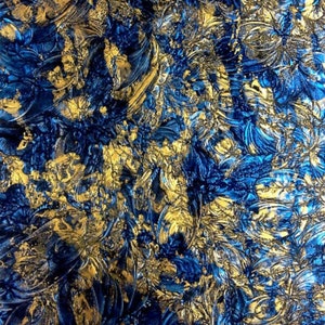 May include: Abstract artwork featuring a textured surface with a combination of deep blue and gold hues. The design showcases a floral pattern with a raised, three-dimensional effect, creating a rich and layered visual texture. The gold accents add a touch of luxury.