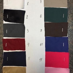 Peut inclure: Douze &eacute;chantillons de tissu num&eacute;rot&eacute;s de 1 &agrave; 12. Les &eacute;chantillons sont dispos&eacute;s en deux colonnes de six &eacute;chantillons chacune. Les &eacute;chantillons sont de diff&eacute;rentes couleurs, notamment le blanc, le noir, le gris, le rouge, le bleu, le beige, le vert, le marron et le rose.