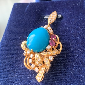 Beautiful Pear Drop Natural Sleeping Beauty Turquoise Pendant with Diamond in 18K yellow gold