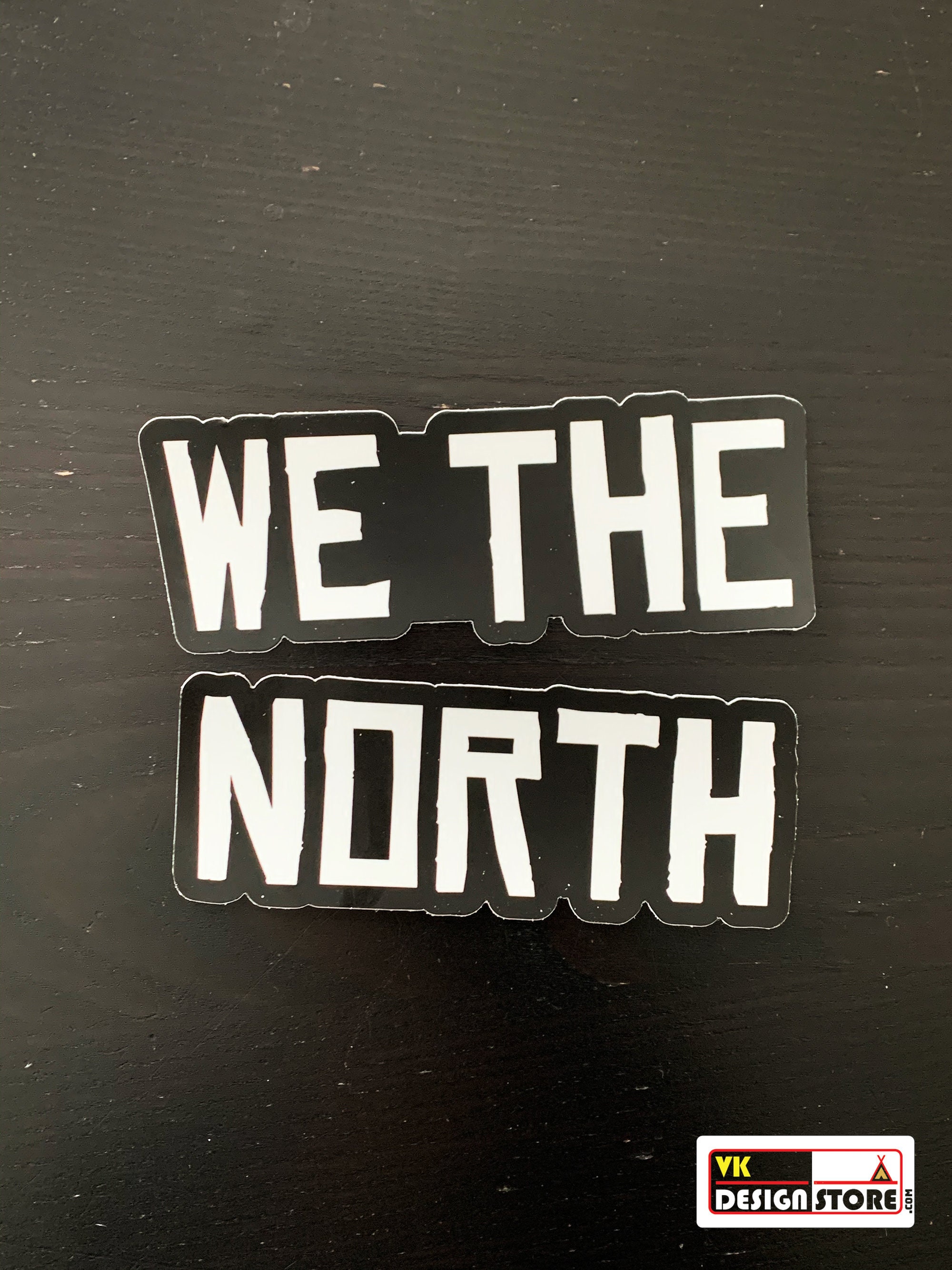 We The North shirts for fans of the Toronto Raptors sit on chairs