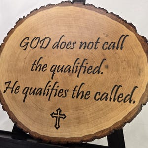 God does not call the qualified. He qualifies the called -- wood-burned sign -- religious, Christian, motivational