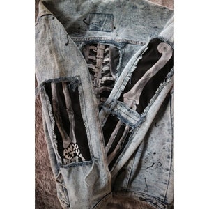 Unleash Your Edgy Side: Hand-Painted Denim Jacket with Aesthetic Bone Art and Ripped Denim Style