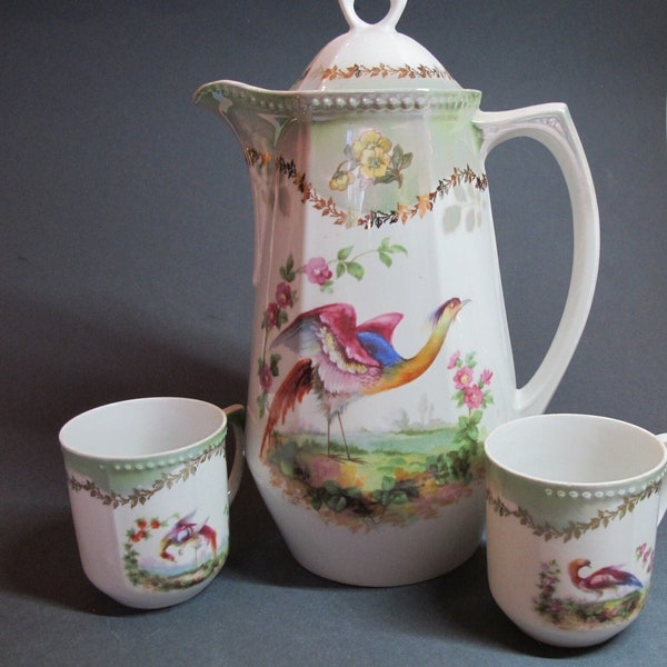Old polished and pearled coffee pot and cups, numbered in fine porcelain with bird, Germany (1930)