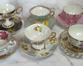Shafford, iridescent porcelain teacups and saucers in various colours and patterns, hand-decorated, Japan circa 1950