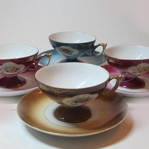 Shafford and Castle China, 4 hand decorated porcelain teacups and saucers in different colours, Japan circa 1950