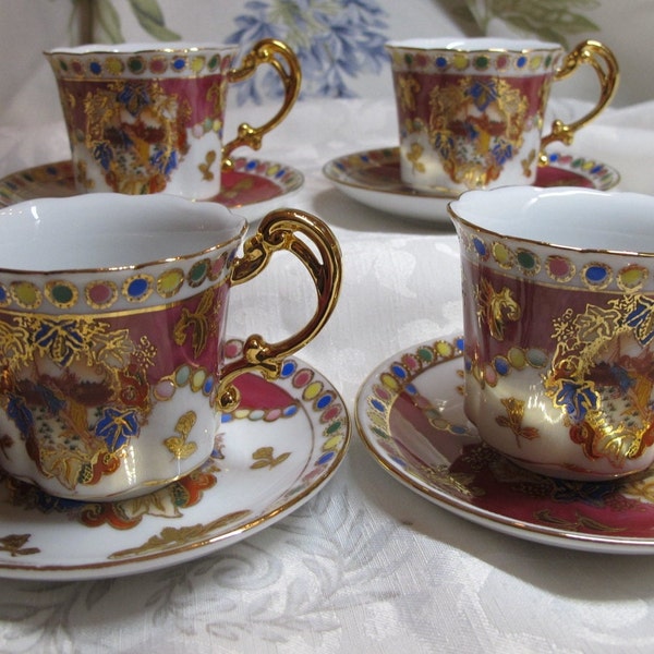 Fine Vintage porcelain, set of 4 coffee cups and their saucer hand painted with romantic scenes and decorated with gold