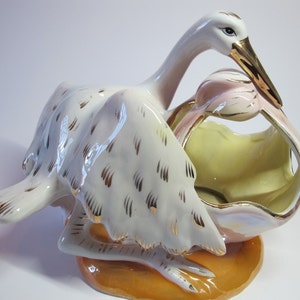 Magnificent planter with stork and porcelain bundle, Italy