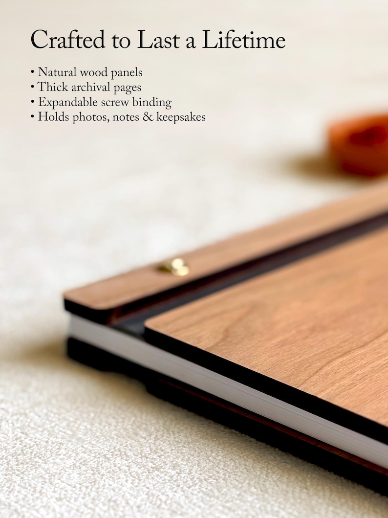 May include: A wooden journal with natural wood panels and thick archival pages. The journal features expandable screw binding and is designed to hold photos, notes, and keepsakes. The text "Crafted to Last a Lifetime" is at the top.