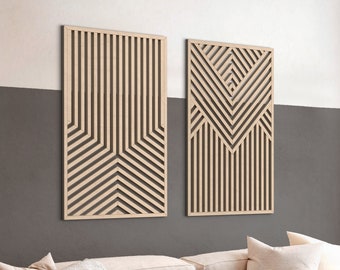 May include: Two geometric wooden wall decor panels with a light wood finish. The panels feature a repeating pattern of vertical and diagonal lines creating a geometric design.