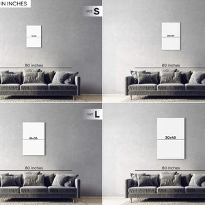May include: Four different sizes of a white canvas print with black text showing the dimensions of each size. The print is displayed on a gray wall above a gray couch with three pillows. The text on the print reads "DIMENSION IN INCHES" and the sizes are "S", "M", "L", and "XL".