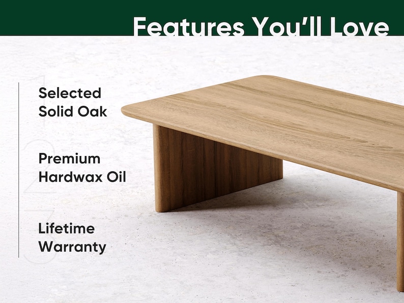 May include: A light brown rectangular coffee table made of solid oak. The table has a minimalist design with a flat top and a single leg on each end. The text "Features You'll Love" is at the top.