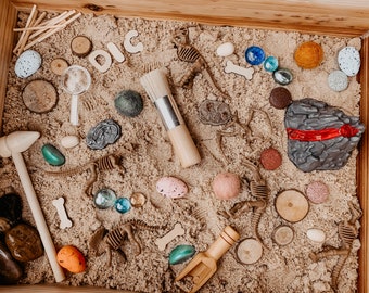 Dig for dinosaurs fossil excavation  sensory bin box tray