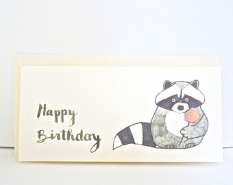 Happy Birthday! Raccoon with lollipops.