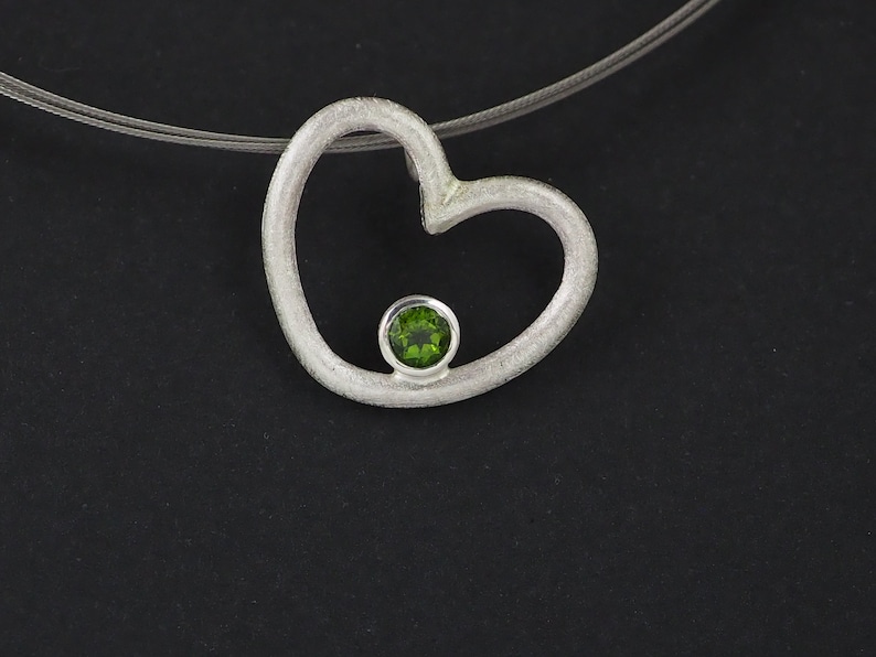 Silver pendant with set stone