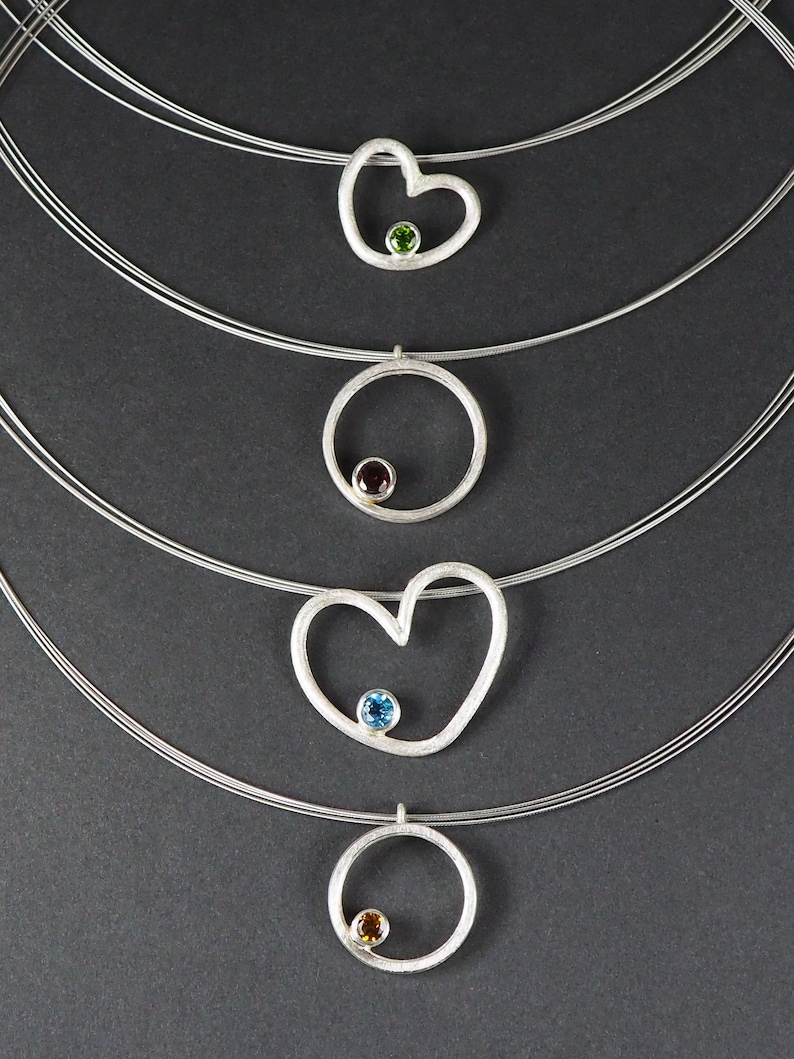 Silver pendant with set stone