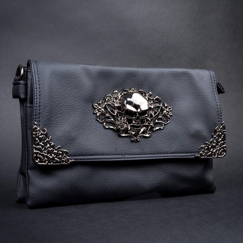Gothic black bag with a silver skull centrepiece and rose detailing by CHOK GothX.