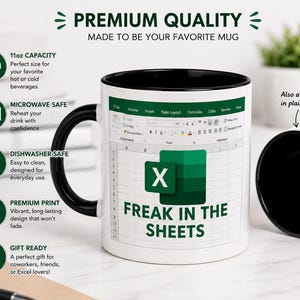 May include: White ceramic mug with a black interior and handle. The mug features a spreadsheet design with the Microsoft Excel logo and the text "FREAK IN THE SHEETS". The mug is 312ml capacity and microwave and dishwasher safe.